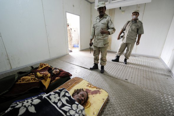 Тіло вбитого лівійського диктатора Муаммара Каддафі 