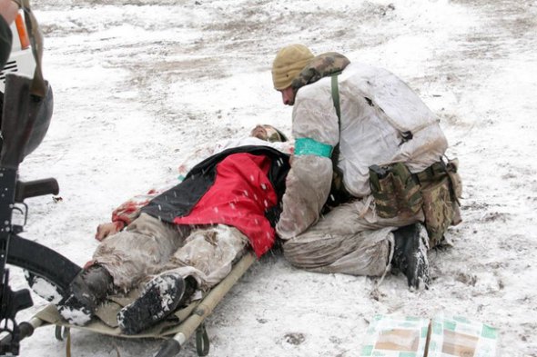 Загиблого Романа Радівілова вкрили червоно-чорним прапором. 18 грудня 2016 року