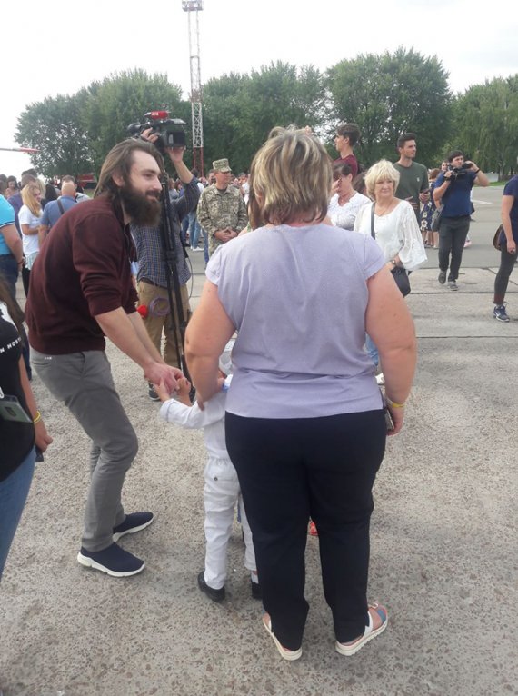Serhij Popov, člen ekipažu katera "Nikopol'", z rodynoju